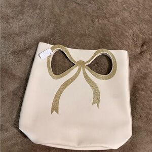 Elegant Cream Tote Bag with Gold Bow Accent